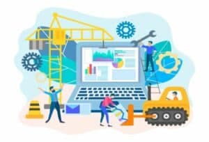People working around a large laptop showing graphs, alongside construction equipment, gears, and industrial elements.