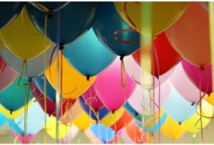 festive colorful background with party balloons